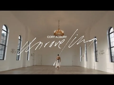 Unraveling official video thumbnail